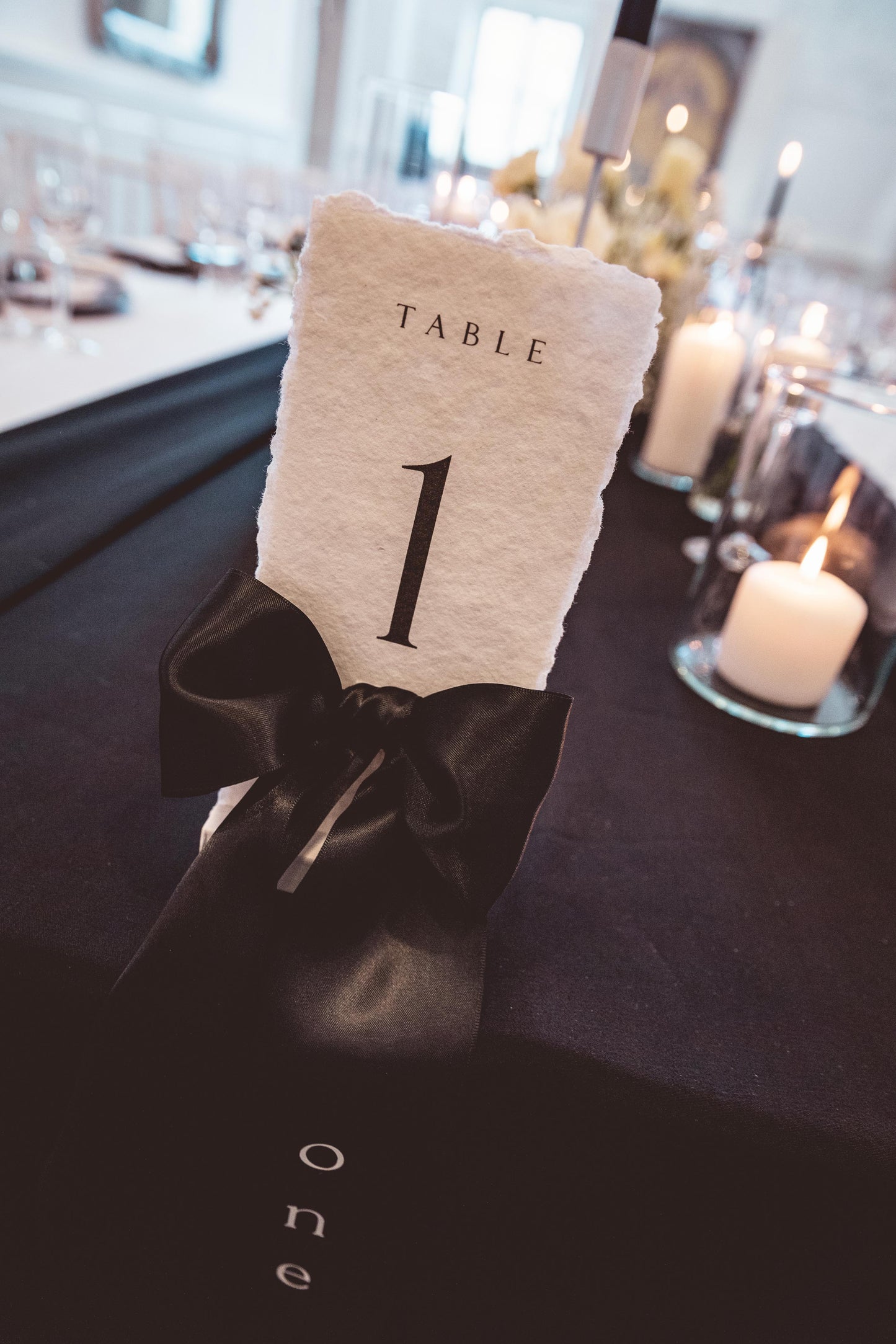 Hand crafted Monochrome Table number with Black Satin Bow