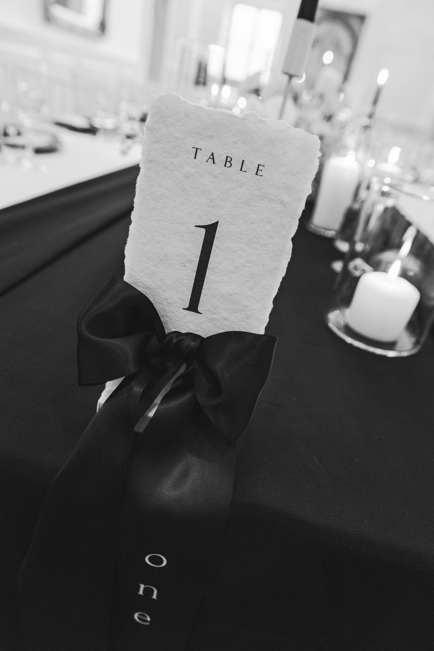 Hand crafted Monochrome Table number with Black Satin Bow