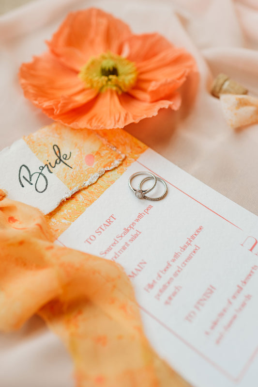 Hand marbled Wedding menu in Oranges and Pinks